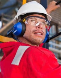 Man wears hearing protection.